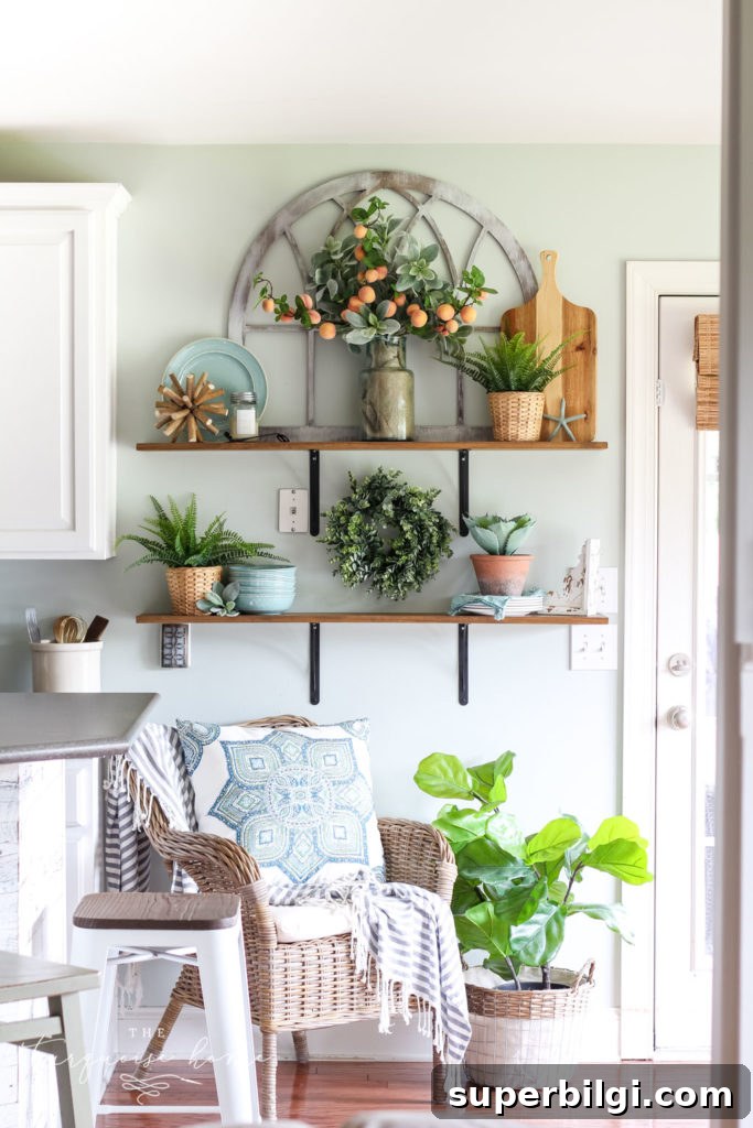 Peach-Inspired Summer Kitchen Decor 5 A Simple Peachy Summer Kitchen with gorgeous open shelves, turquoise plates, peach stems and fiddle leaf fig