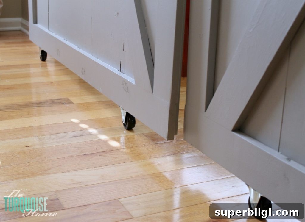 DIY Sliding Barn Door: Step-by-Step Build Guide 8 DIY Simple Sliding Barn Doors | TheTurquoiseHome.com