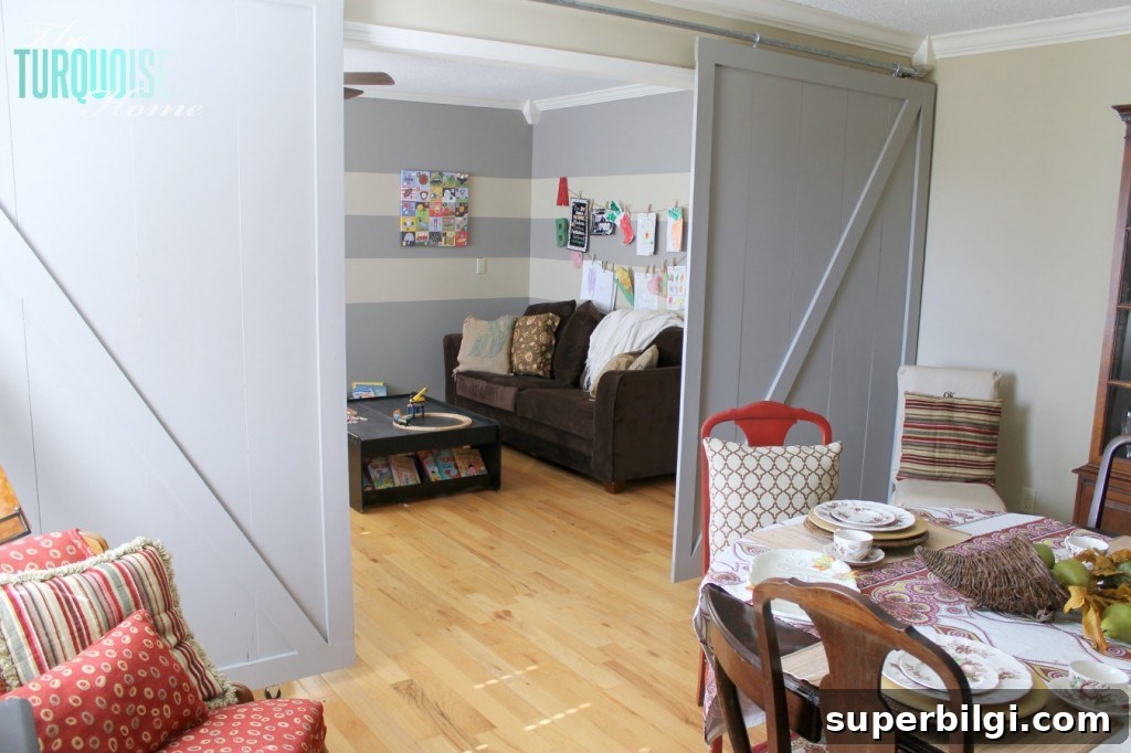 DIY Sliding Barn Door: Step-by-Step Build Guide 10 DIY Simple Sliding Barn Doors | TheTurquoiseHome.com