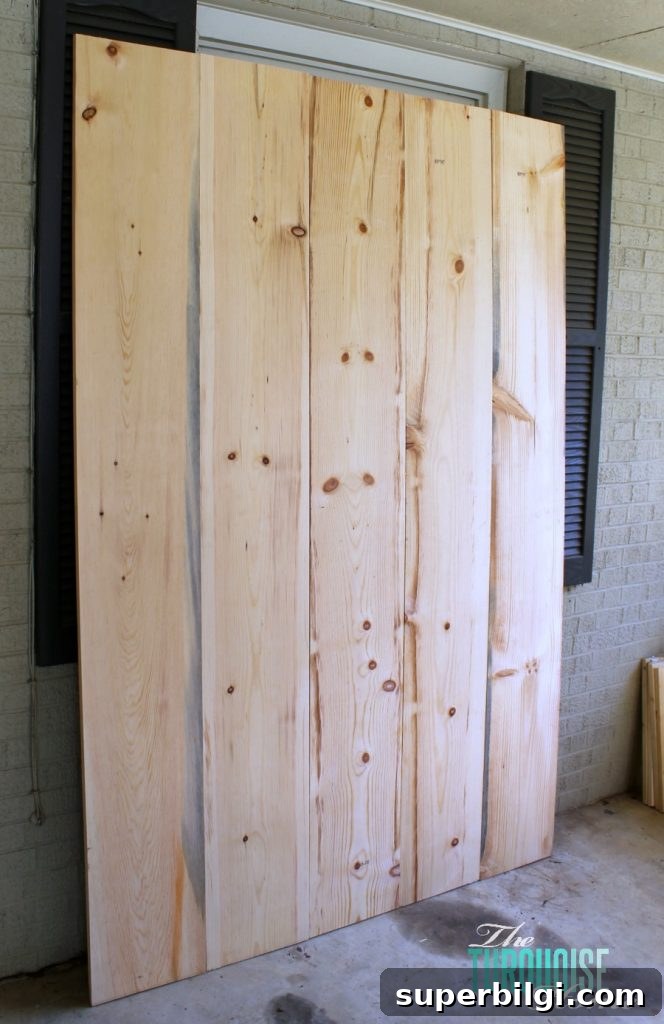 DIY Sliding Barn Door: Step-by-Step Build Guide 4 DIY Simple Sliding Barn Doors | TheTurquoiseHome.com