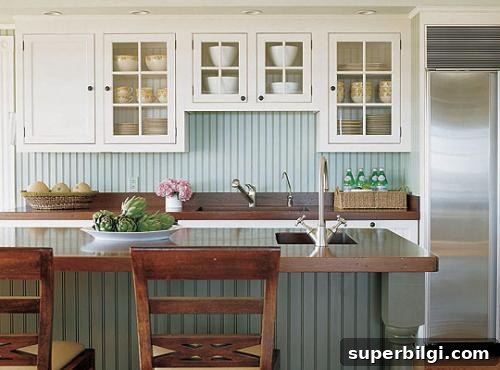 Benjamin Moore Wythe Blue (HC-143) Paint Review and Room Photos 11 Wythe Blue beadboard backsplash in a kitchen with white cabinets.