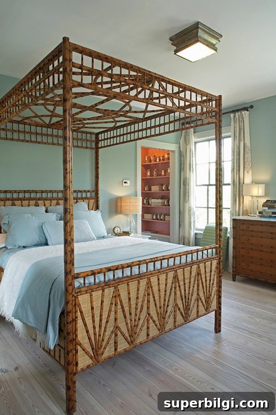 Benjamin Moore Wythe Blue (HC-143) Paint Review and Room Photos 6 Gorgeous bedroom with Wythe Blue painted walls and a wooden bed.