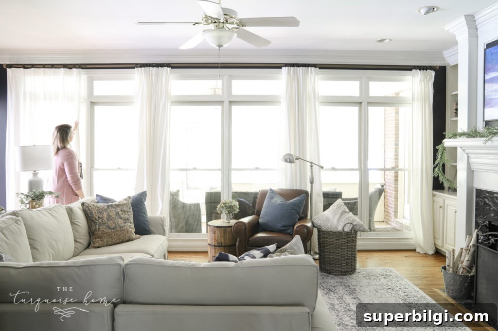 Living Room Decor Ideas to Transform Your Space 11 Inexpensive long curtain rods cover wall of windows