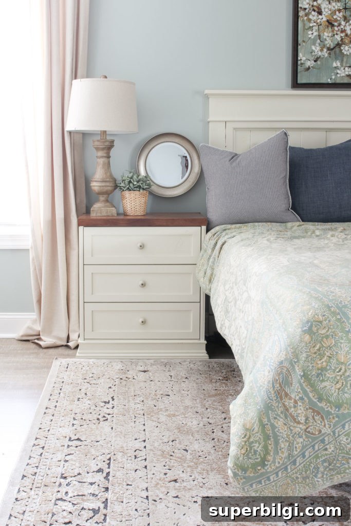 How to Choose the Right Rug Size for Your Bedroom 5 Gorgeous Ivory and Beige Antique-style Rug in a Farmhouse Master Bedroom. What size rug to buy for a king bed?
