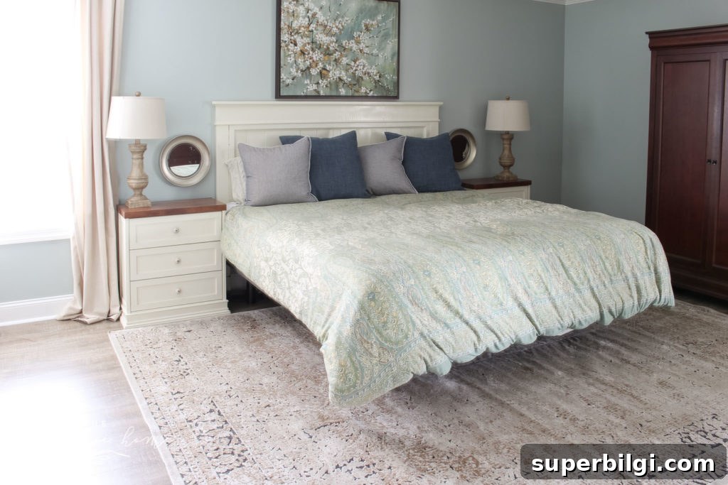 How to Choose the Right Rug Size for Your Bedroom 6 Gorgeous Ivory and Beige Antique-style Rug in a Farmhouse Master Bedroom. What size rug to buy for a king bed?