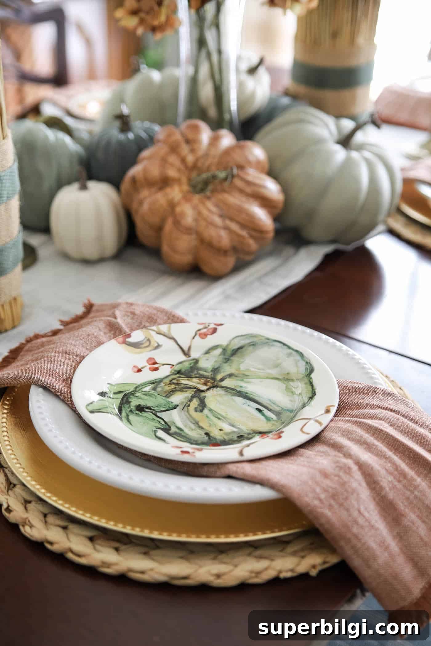 Cozy Fall Kitchen Decor Ideas to Refresh Your Space 7 Rust colored cloth napkins and pumpkin plates