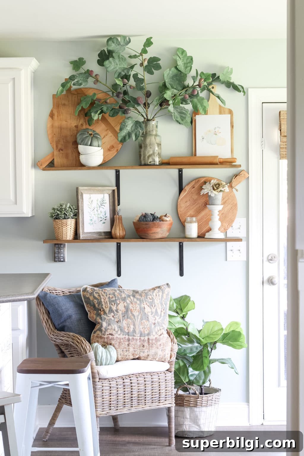 Cozy Fall Kitchen Decor Ideas to Refresh Your Space 10 Open kitchen shelves decorated for fall | fig leaves | fiddle leaf fig | cutting boards | antique pizza boards | fall decor ideas