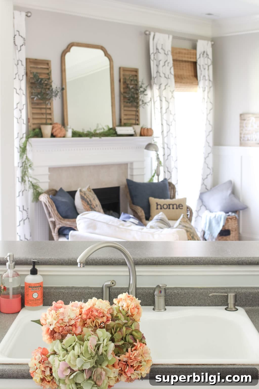 Cozy Fall Kitchen Decor Ideas to Refresh Your Space 13 Green and coral pink hydrangeas grace the white sink in a cozy fall kitchen. Lots of fall home decor ideas in this post!