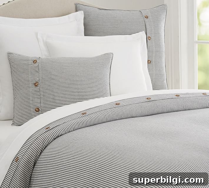 Farmhouse Bedding Ideas to Refresh Your Bedroom 14 Navy and White Duvet with Button Trim | farmhouse bedding