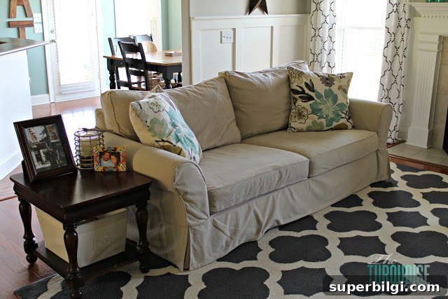 Living Room Makeover Final Reveal: Stunning Before and After 10 Living room with warm wood accents and turquoise decor