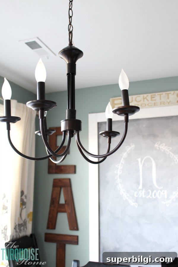 12 Farmhouse Chandelier Ideas to Transform Your Home 4 Bel Air 5-Light Chandelier | My new farmhouse chandelier for my kitchen | TheTurquoiseHome.com