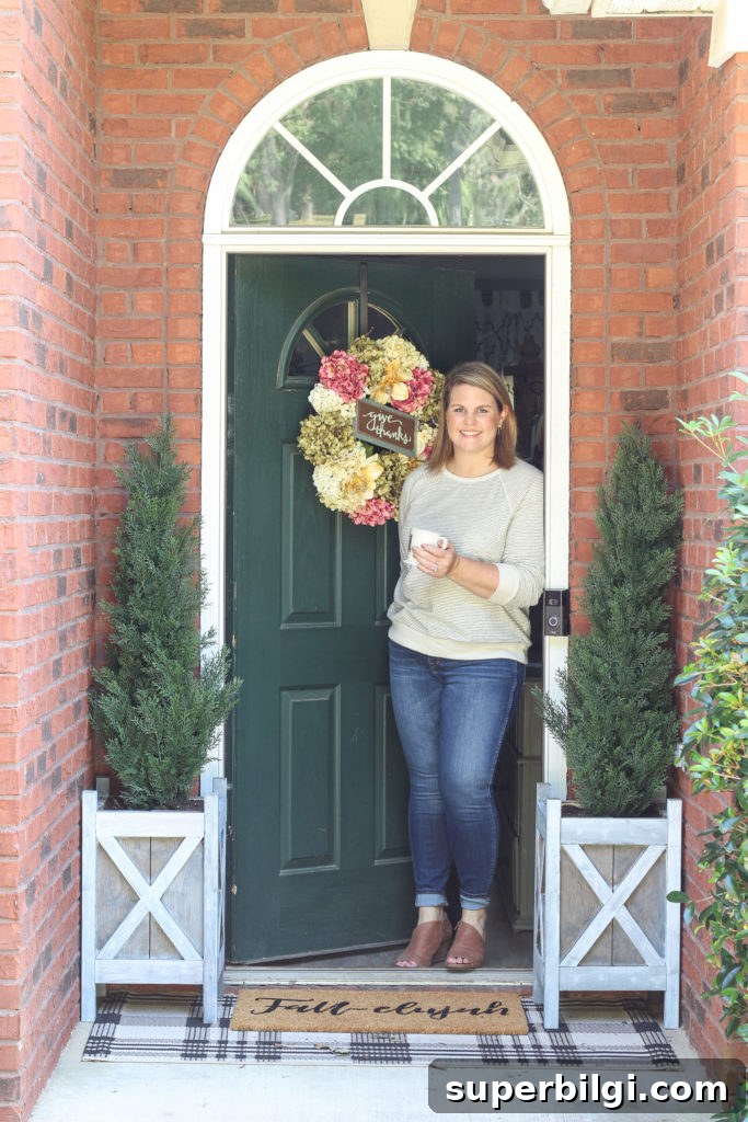 How to Create a Gray Wash Finish on Wood 2 Cozy fall home tour with simple decor ideas for anyone on any budget! Hydrangea wreath, tall evergreen topiaries, fall-elujah doormat.