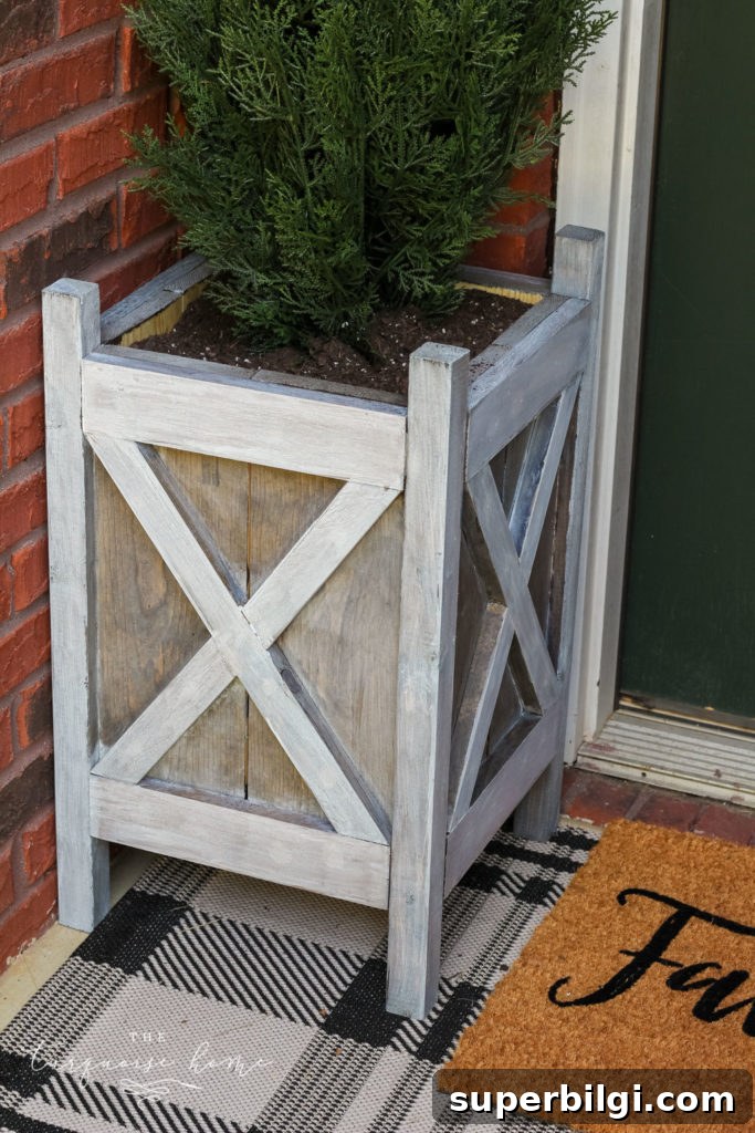 How to Create a Gray Wash Finish on Wood 7 Gray washed wood technique on DIY wooden planters for the front door!