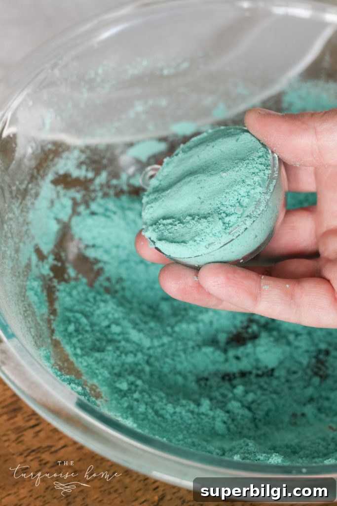How to Make Bath Bombs with Printable Gift Tags 8 DIY Bath Bombs - add mixture to each side of the mold