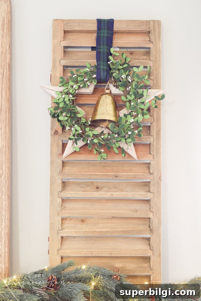 Minimalist Christmas Mantel Decorating Ideas 4 Green and Navy Simple Christmas Mantel - shutter with wooden star, wreath and bell.