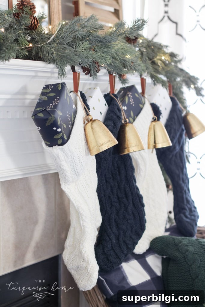 Minimalist Christmas Mantel Decorating Ideas 6 Green and Navy Simple Christmas Mantel - chunky cable knit stockings with bell ornaments
