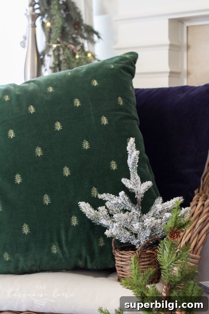 Minimalist Christmas Mantel Decorating Ideas 9 Green and Navy Simple Christmas Mantel - velvet and gold embroidered tree pillow