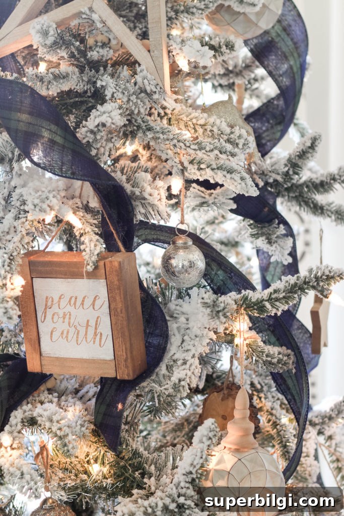 Flocked Plaid Christmas Tree Decorating Ideas 7 Blue and Green Plaid Ribbon on a Flocked Christmas Tree