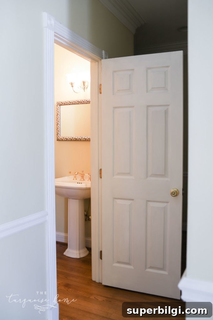 Our New Home Tour: Design, Layout and Renovation Details 15 The powder bathroom in the hallway.