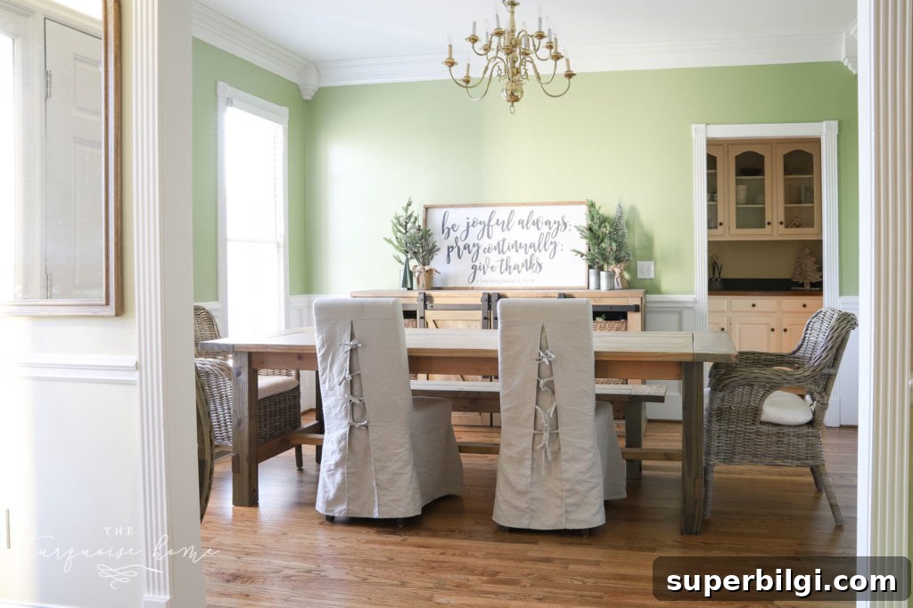Our New Home Tour: Design, Layout and Renovation Details 9 Dining room with green walls