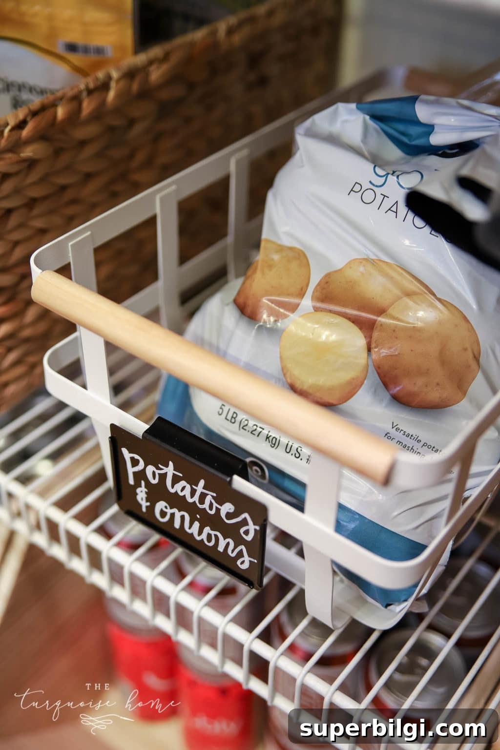 How to Organize Your Pantry for a Clutter-Free Kitchen 11 White metal basket for potatoes and onions