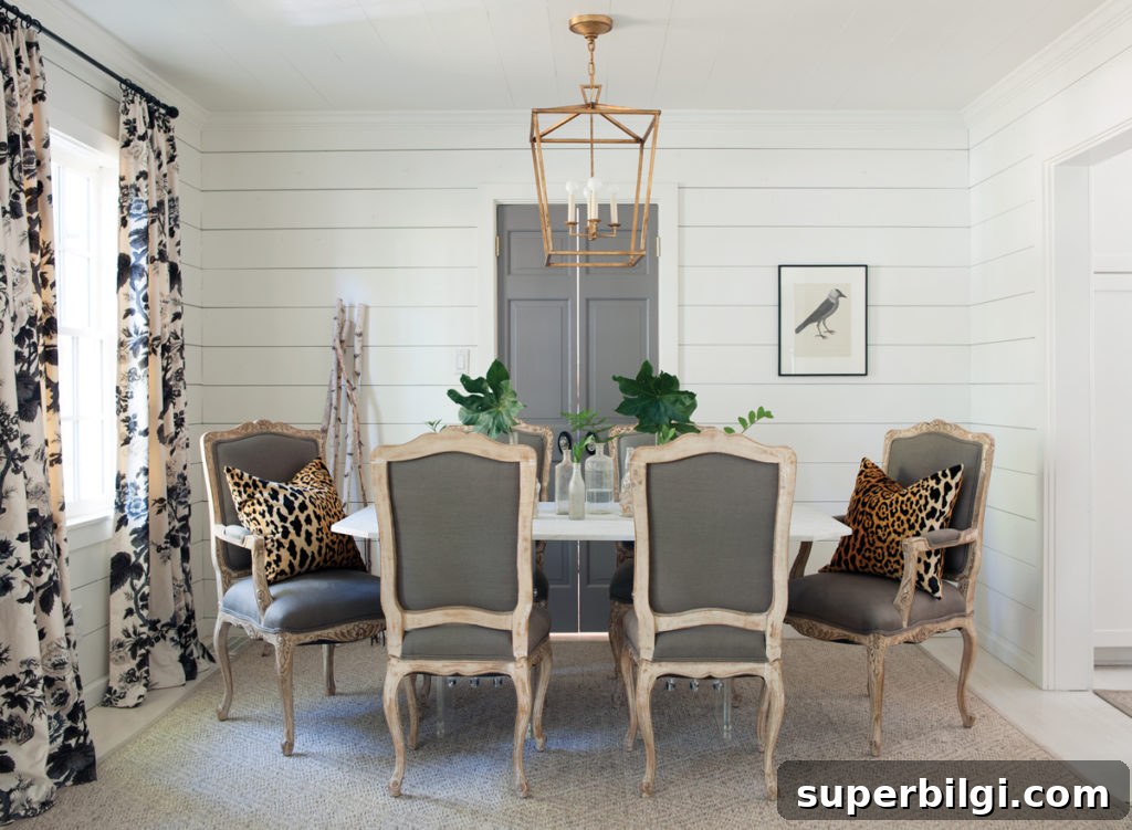 17 Stunning Dining Room Chandeliers to Transform Your Space 8 Dining Room with Shiplap Walls and Darlana Pendant Chandelier