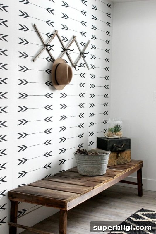 7 Stylish Hallway Decor Ideas to Transform Your Space 13 hallway with wooden bench and white wallpaper with black arrows