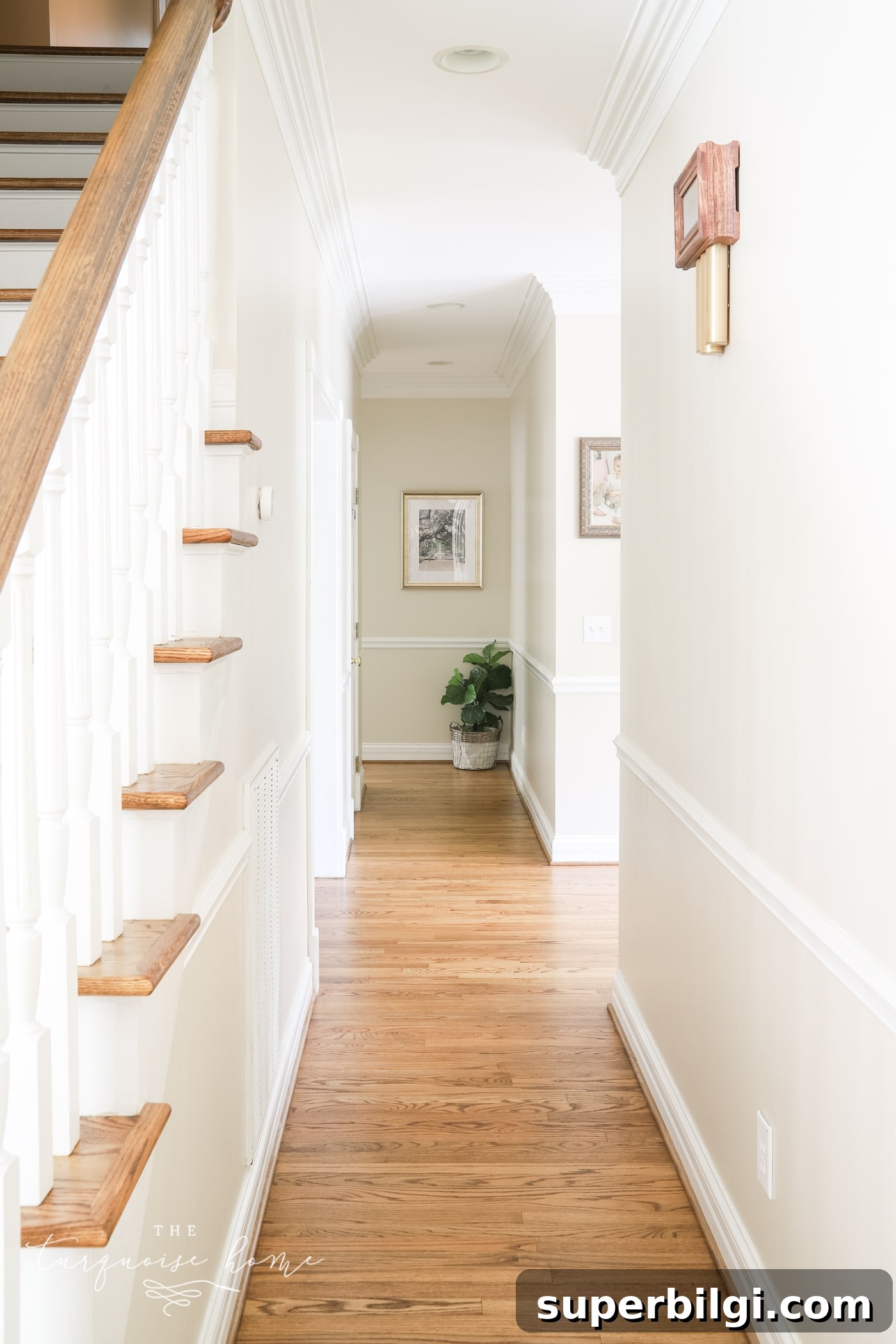 7 Stylish Hallway Decor Ideas to Transform Your Space 5 Art and a Plant in the Hallway