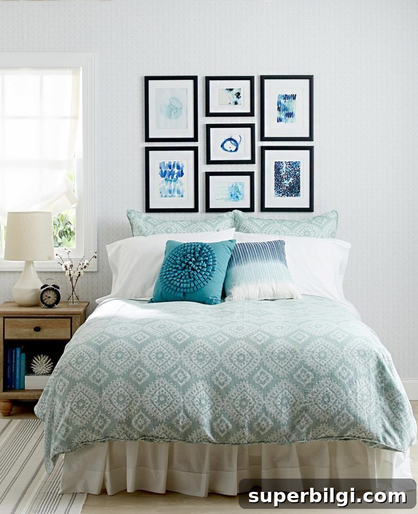 gallery style art hanging above the bed