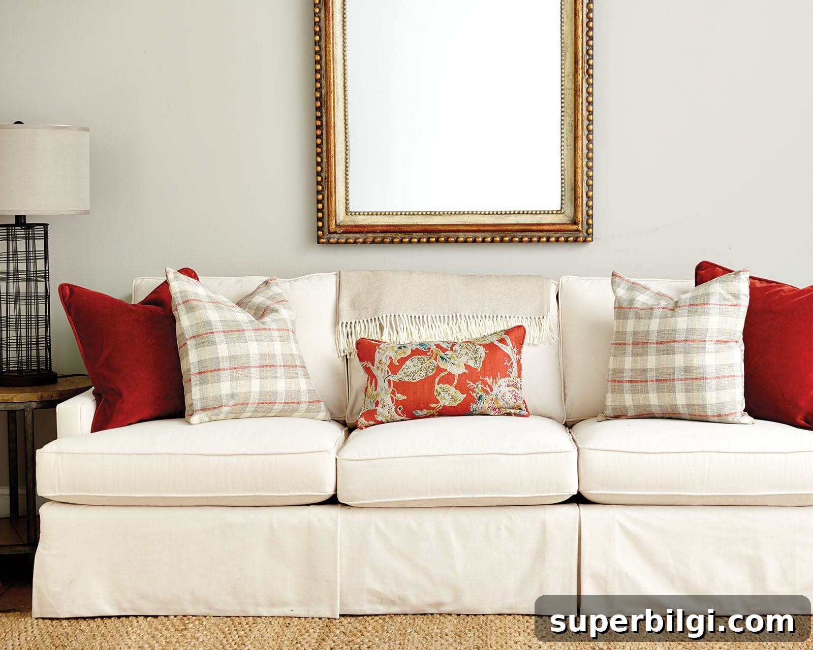 Choose and Arrange Sofa Pillows for Living Room Decor 8 cream colored couch with multiple throw pillow sizes