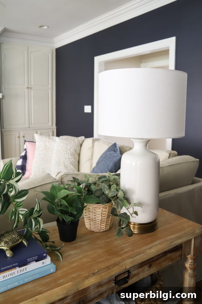 White USB Lamps and Faux Plants and Wooden Console Table
