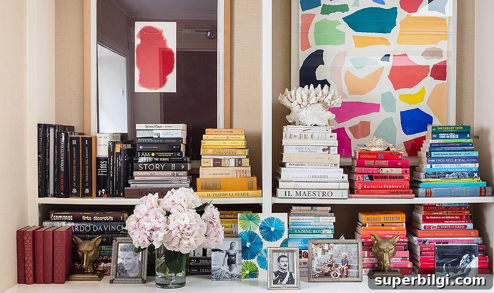6 Creative Ways to Style Books for Home Decor 3 shelving decor with flowers, trinkets and books stacked according to color