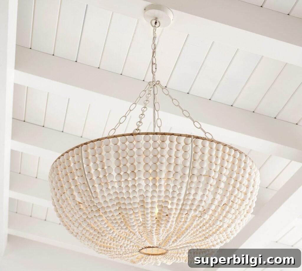 17 Stylish Entryway Lighting Fixtures for Quick Installation 10 Bristol Wood Bead Chandelier in White Wash