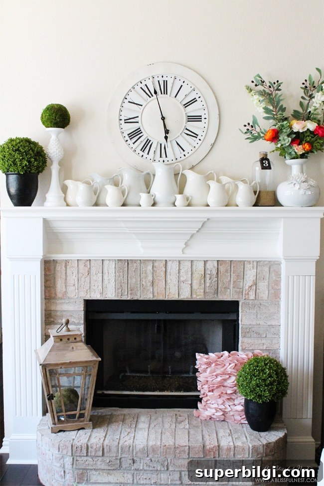 25 Spring Mantel Decor Ideas to Refresh Your Home 10 spring mantel decor that includes greenery, blooms and pitchers of various sizes