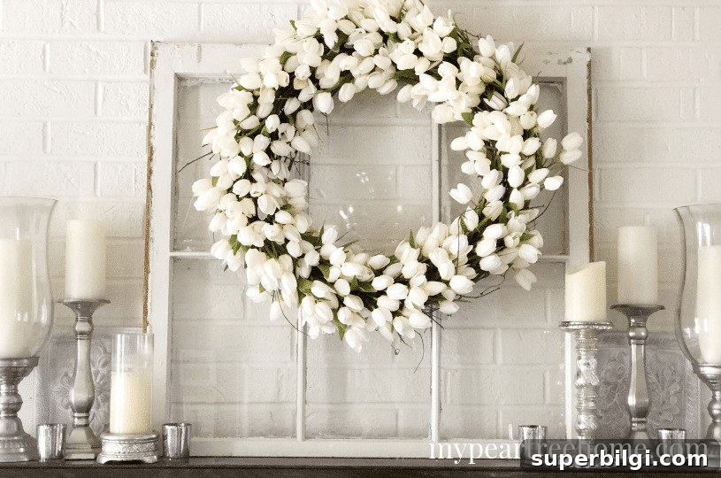 25 Spring Mantel Decor Ideas to Refresh Your Home 22 lovely white-themed spring fireplace mantel decor with white tulip wreath
