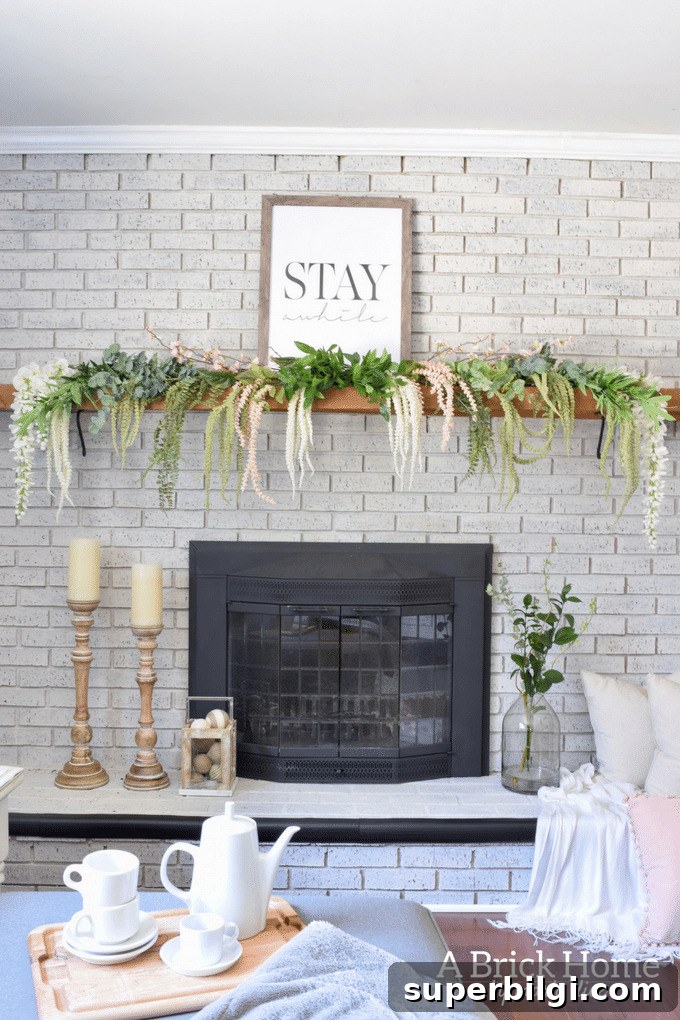 25 Spring Mantel Decor Ideas to Refresh Your Home 24 spring fireplace mantel with cascading greenery