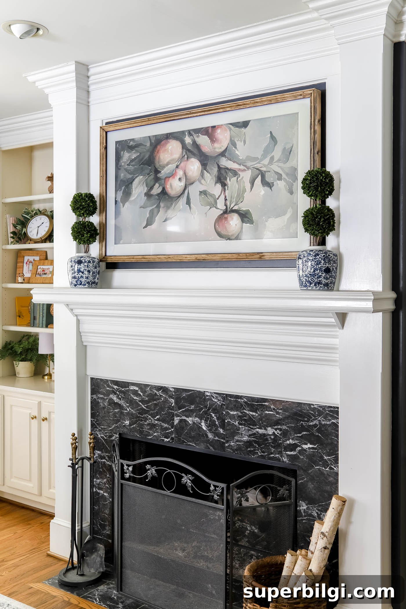 25 Spring Mantel Decor Ideas to Refresh Your Home 4 Framed TV over a fireplace mantel in living room