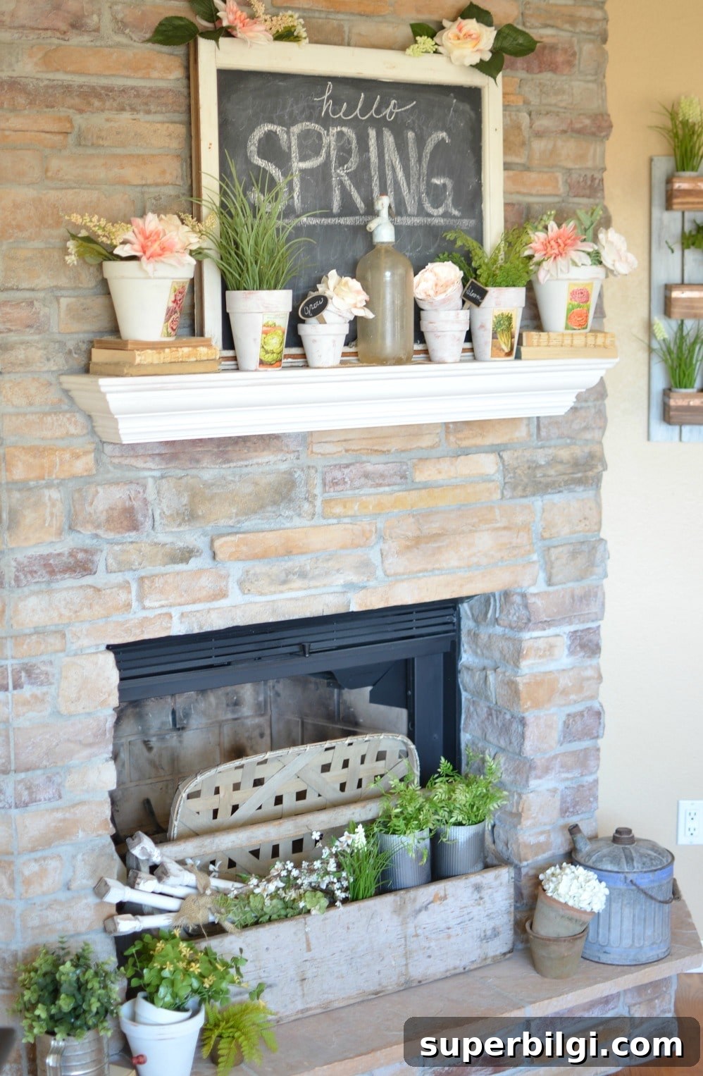 25 Spring Mantel Decor Ideas to Refresh Your Home 8 fireplace mantel with spring decor including potted blooms and a sign