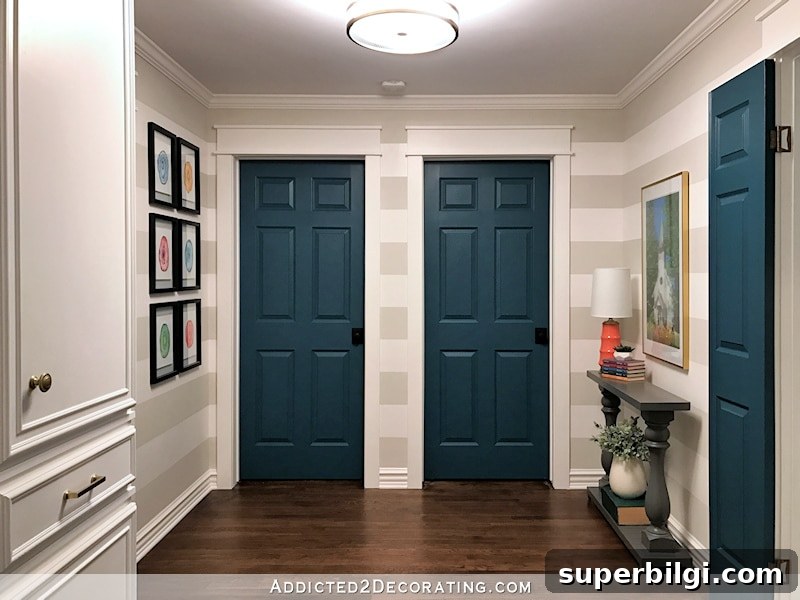 Interior Door Paint Colors That Transform Your Home 8 foyer with neutral decor and deep blue painted interior doors