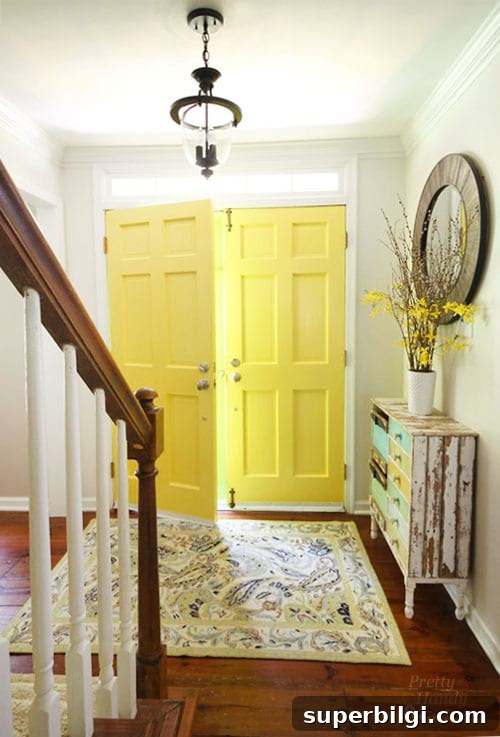 Interior Door Paint Colors That Transform Your Home 5 Entryway with Highlighter Yellow painted door
