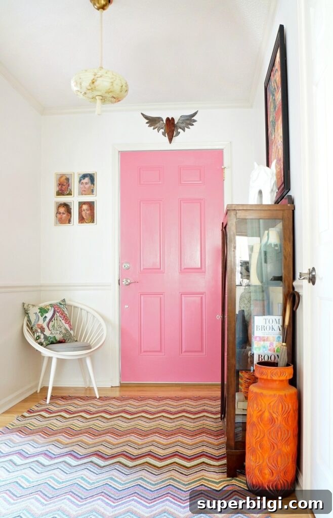 Interior Door Paint Colors That Transform Your Home 7 boho pink interior door in an entryway