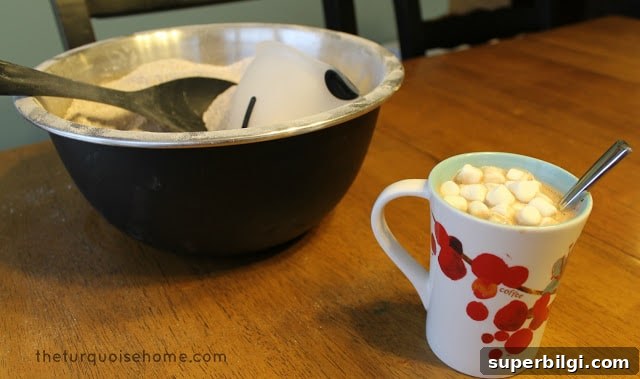 Decadent Creamy Hot Chocolate Recipe 5 Stirring a warm mug of homemade hot chocolate