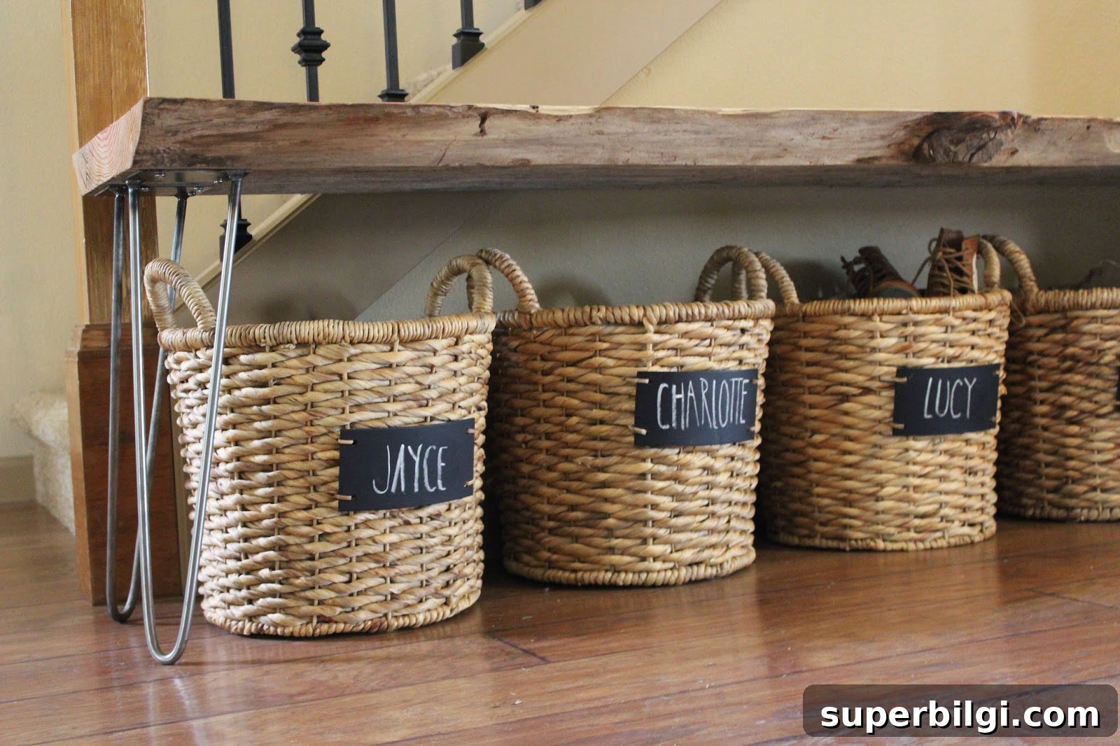 15 Space-Saving Storage Ideas for Small Entryways 7 Small entryway storage ideas: labeled baskets tucked away underneath a bench keeps personal belongings organized and out of sight.