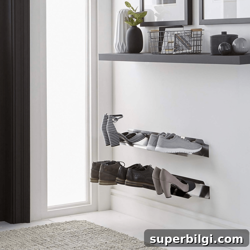 15 Space-Saving Storage Ideas for Small Entryways 12 Wall-mounted shoe rack keeps this entryway clean and organized.