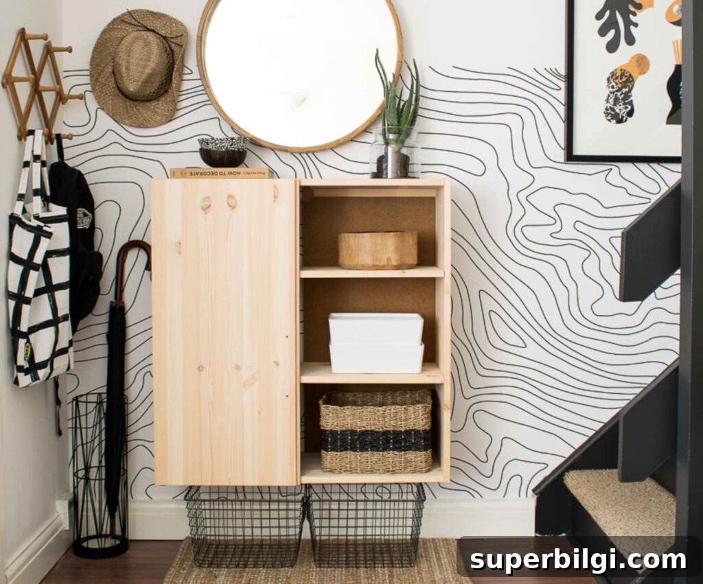 15 Space-Saving Storage Ideas for Small Entryways 16 Wall-mounted cabinet with baskets and hooks keeps belongings corralled in a small space.