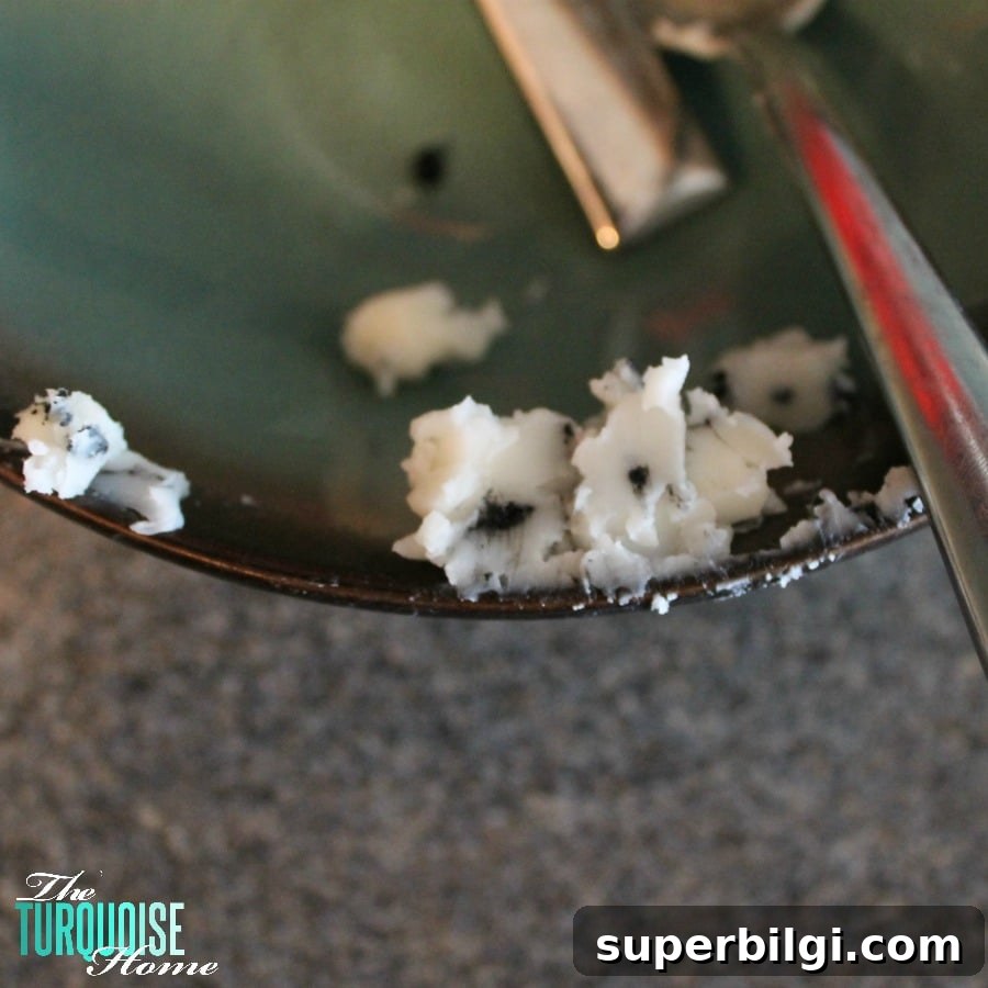 10 Creative DIY Ideas to Upcycle Old Candles 4 Remove all of the old burned candle pieces