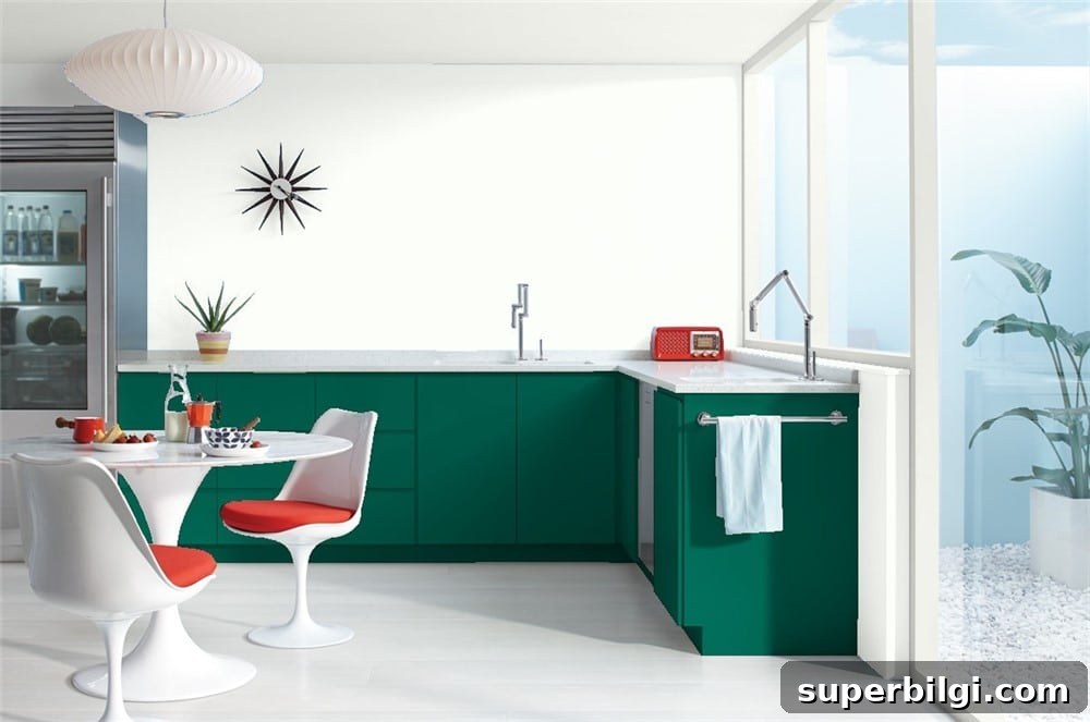 Green Paint Colors That Transform Your Home 18 Green Bay by Benjamin Moore: Emerald green lower kitchen cabinets.