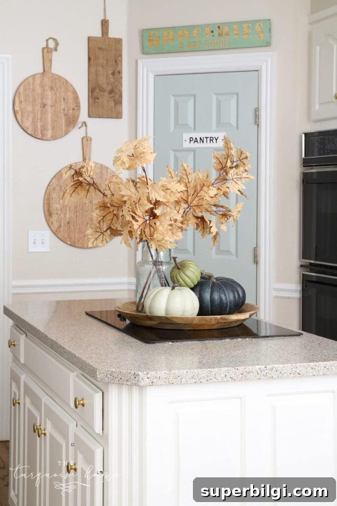 Green Paint Colors That Transform Your Home 8 Comfort Gray painted kitchen pantry door.