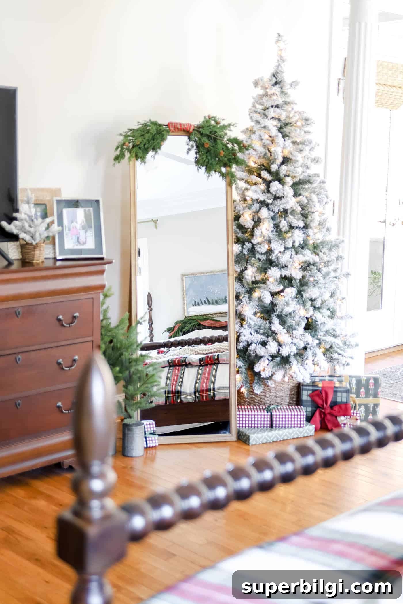 Cozy Christmas Bedroom Decorating Ideas and Inspiration 3 flocked, naked tree in primary bedroom Christmas decor