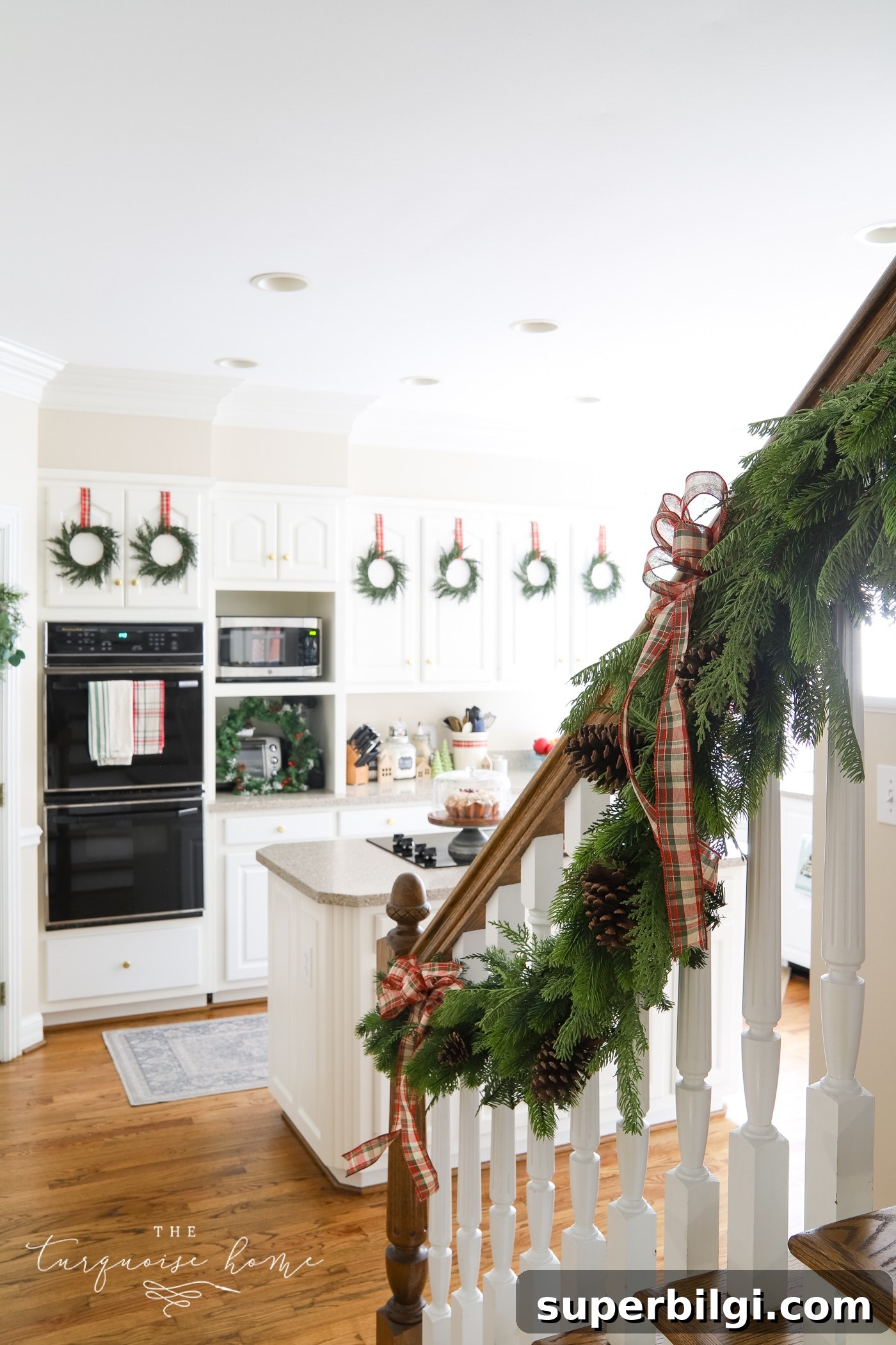 Transform Your Kitchen for Christmas in 3 Steps 6 Greenery on the Stair Banister
